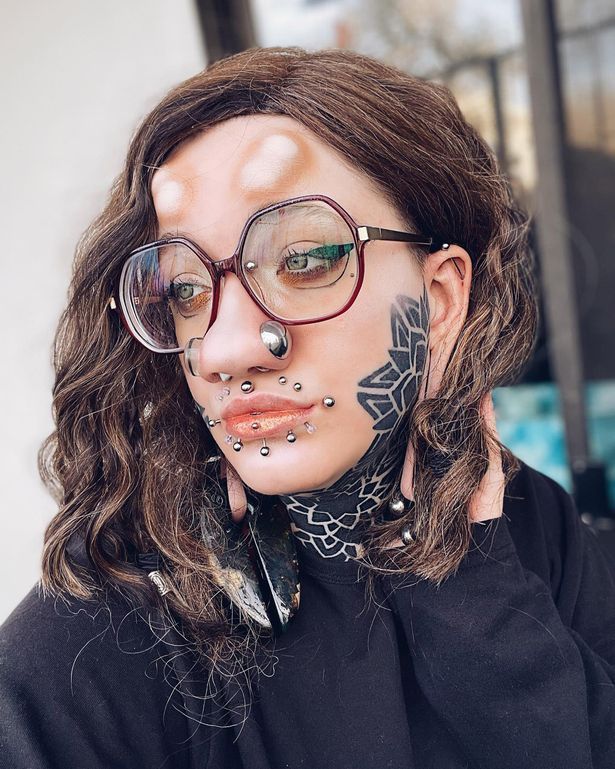 #Person #forehead #horns #nose #plugs #kids #run #street